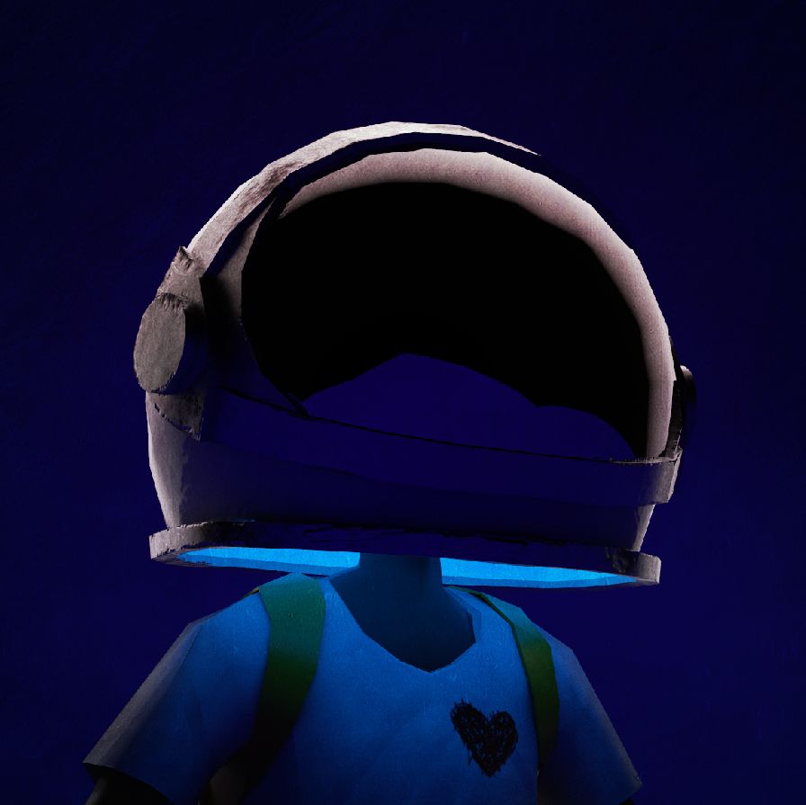 Close-up of Aku's helmet from below, lit in blue with the red heart on his shirt visible